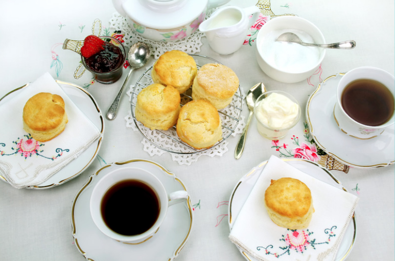 high tea with scones with cream and jam